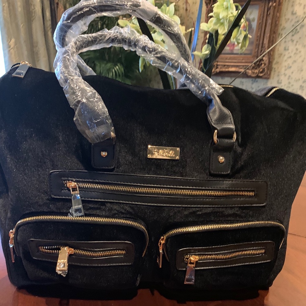 Bebe duffle bag. Brand new, yet to be used